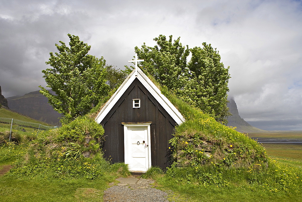 Seventeenth-century sod church, the smallest in Iceland, Nupsstaï£¿ur farmyard, southern coast of Iceland, Atlantic Ocean