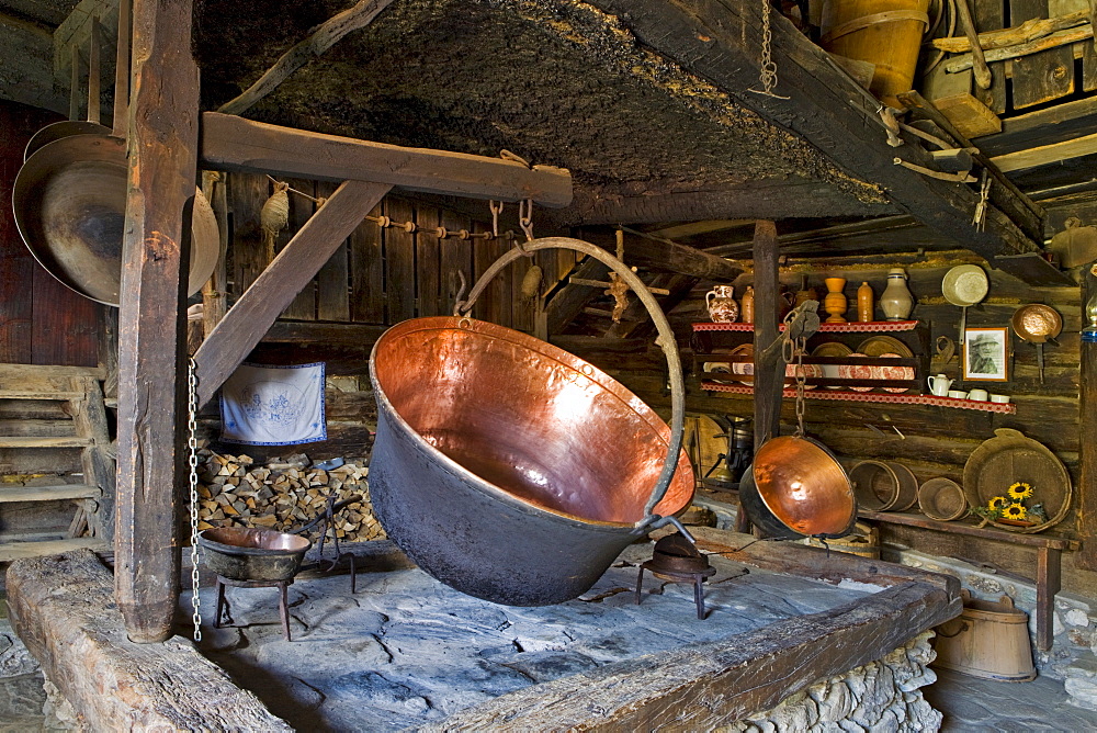 Copper kettles in a rustic kitchen, Weissalm alpine pasture, Grossarltal, Salzburg, Austria, Europe