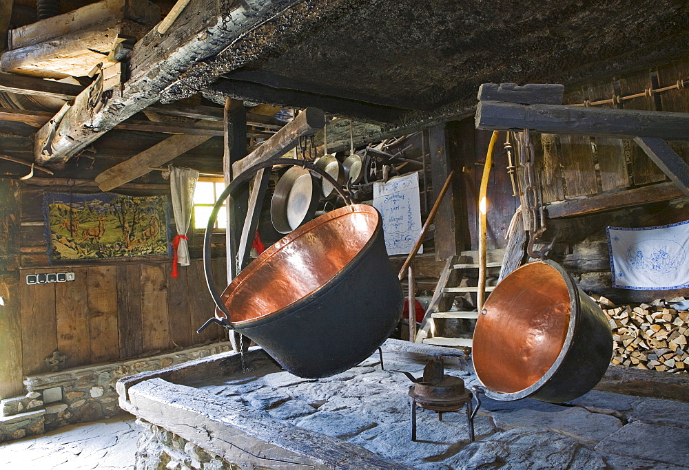 Copper kettles in a rustic kitchen, Weissalm alpine pasture, Grossarltal, Salzburg, Austria, Europe