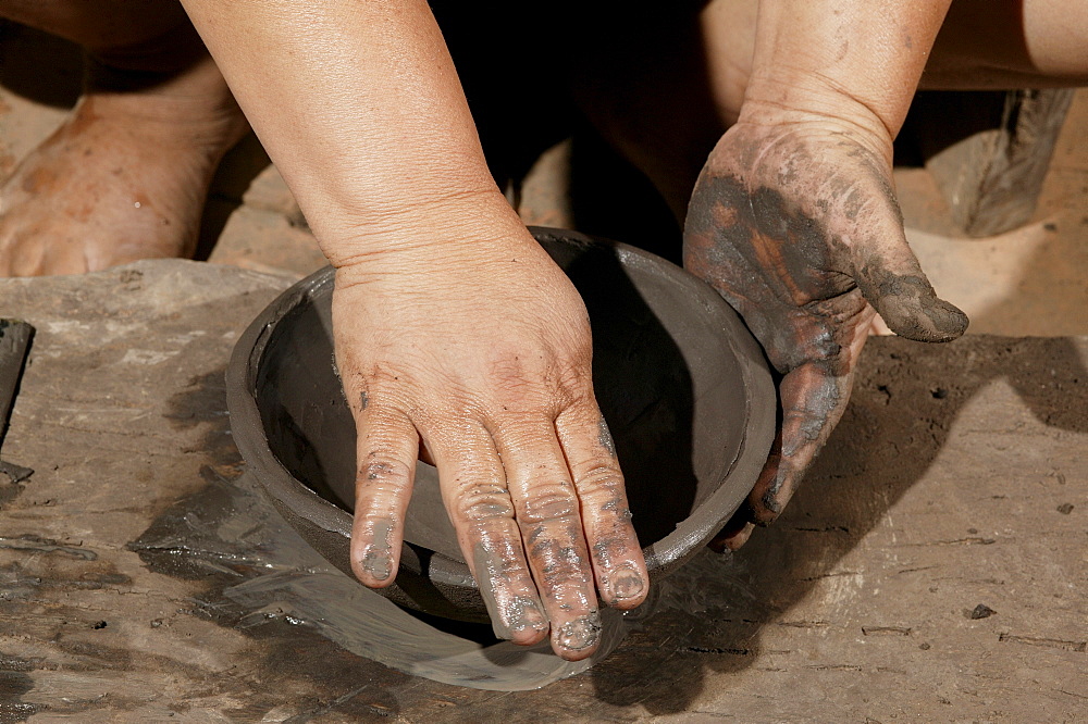 Potter making pottery, Caacupe, Paraguay, south America