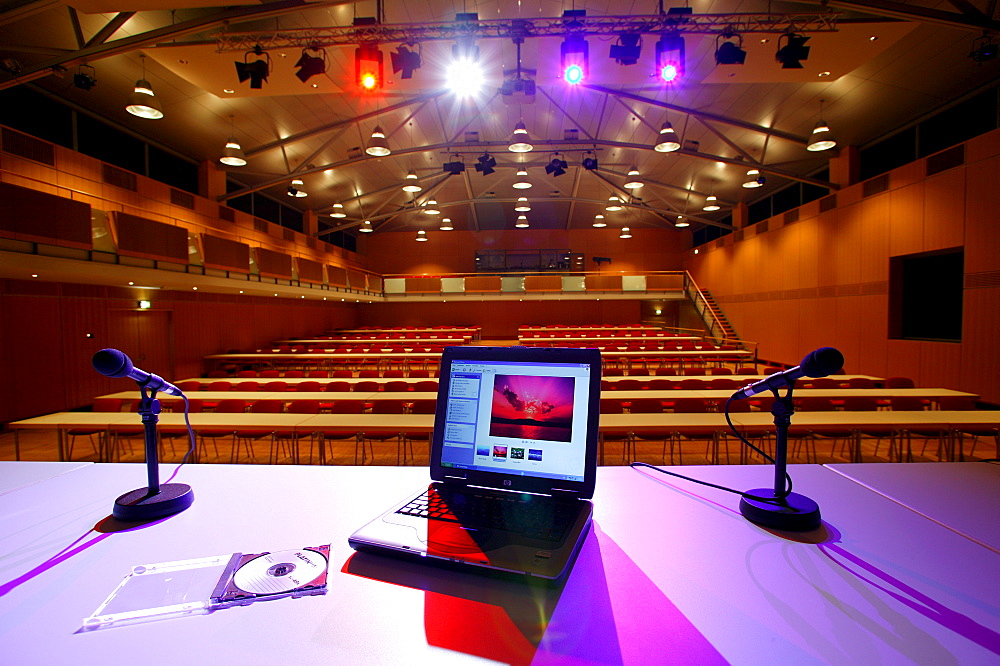 Notebook in front of an auditorium