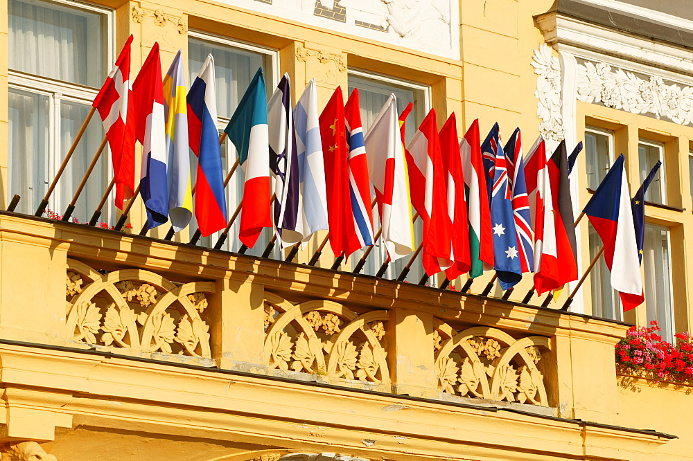 House front with international flags, Hotel Zvon, Budweis, Ceske Budejovice, Bohemia, Czech Republic