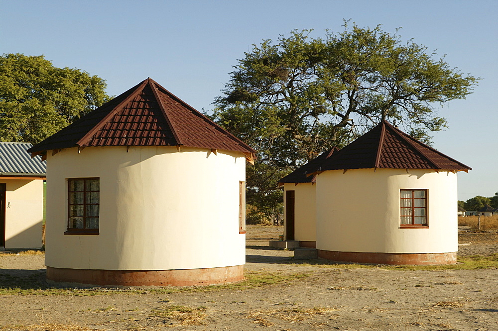 New buildings modeled after traditional round-huts, Sehitwa, Botswana, Africa