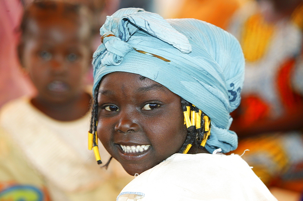 Girl wearing a head-wrap, Cameroon, Africa