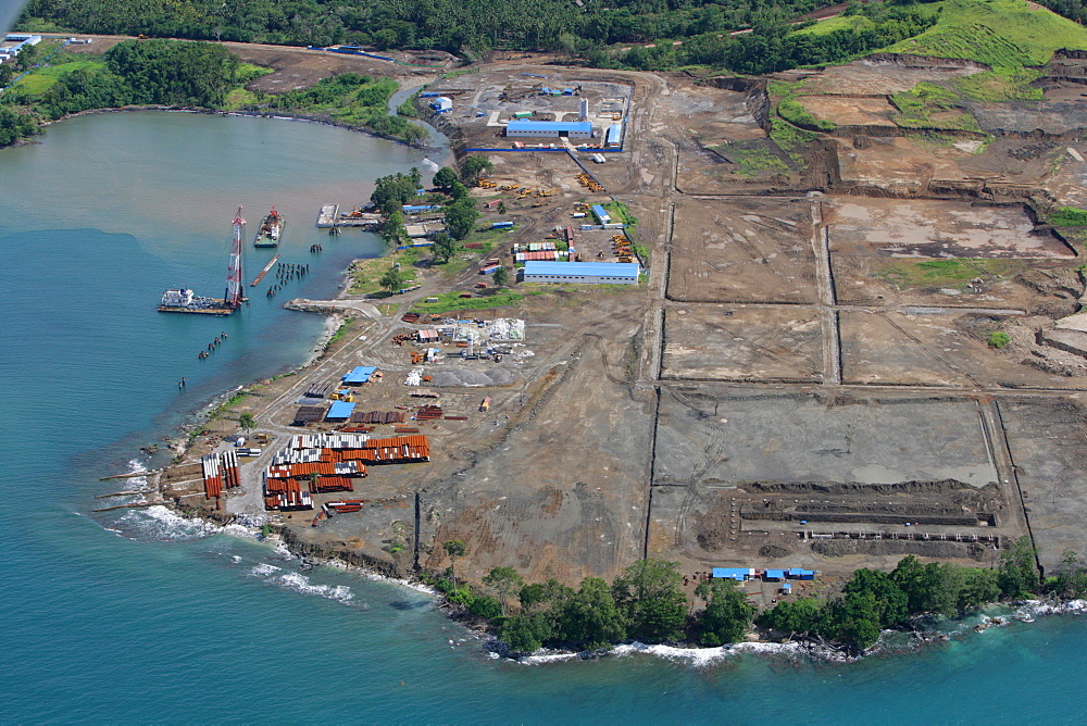 Refinery and harbour premises being built, at a nickle mine, chinese mining association, Basamuk, Papua New Guinea, Melanesia,