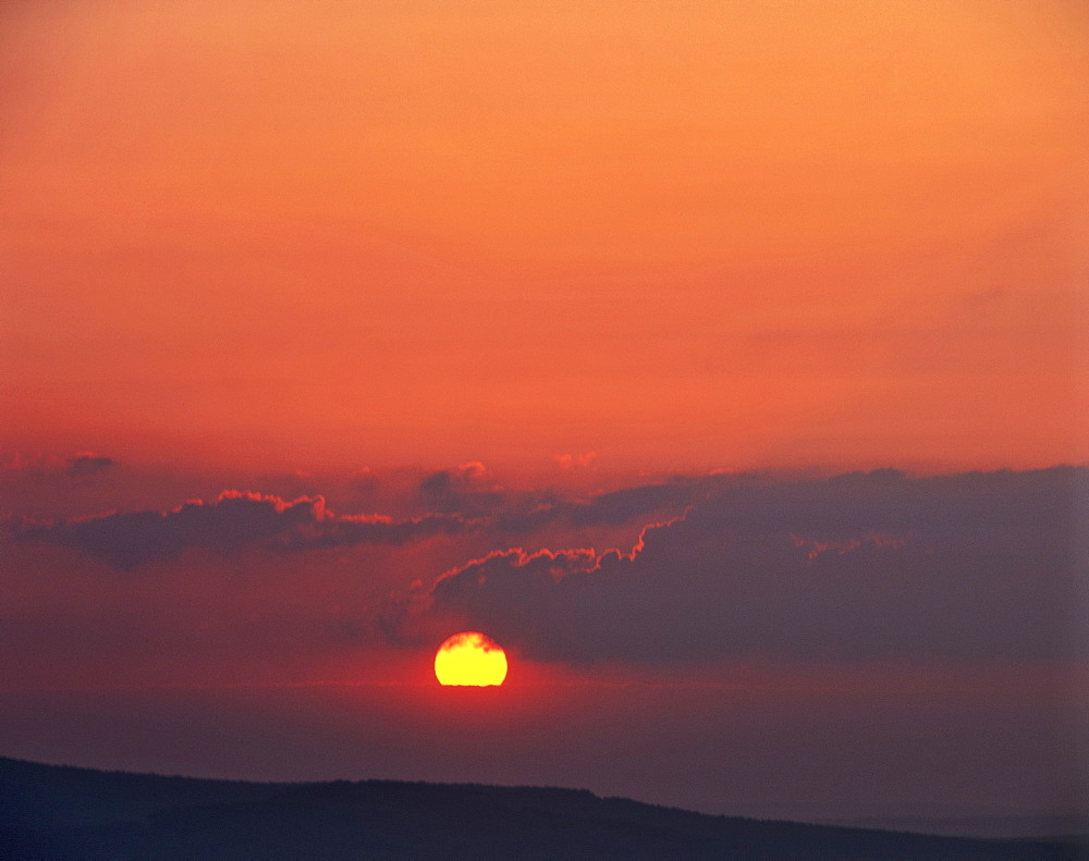 Sunset in a glowing night sky