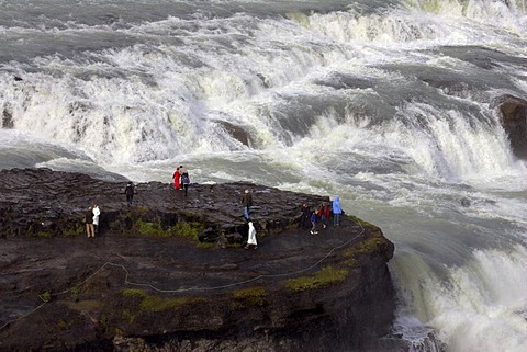 Tourists at Gullfoss-waterfall at the Hvita-river in Iceland - Iceland, Europe