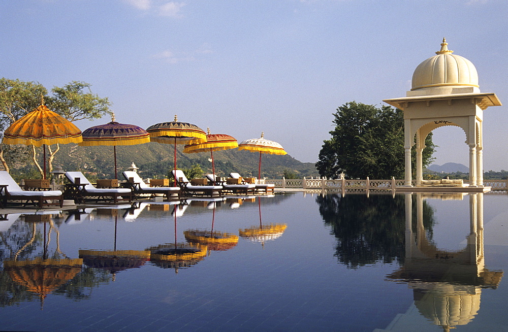 IND; India, Udaipur : Luxury Hotel resort of the Oberoi group. Udaivilas at the Pichola lake. One of many swimming pools. |