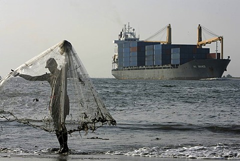 Net fisching and container ship, Fort Cochin, Kerala, India