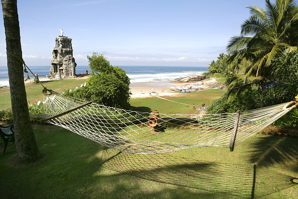 Hammock overlooking the beach at Somatheeram Ayurveda Resort, traditional Ayurvedic medicine spa resort, Trivandrum, Kerala, India, Asia