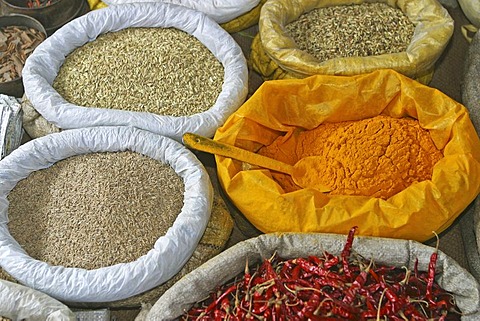 Rice, saffron, chilies in bags at the market in Chatra, Westbengalia, India