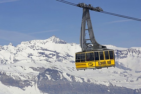 Gondola Schoolbus from Crap Sogn Gion to the Crap Masegn in ski resort White Arena, Flims, Laax, Falera, above sea of clouds, Grisons, Switzerland