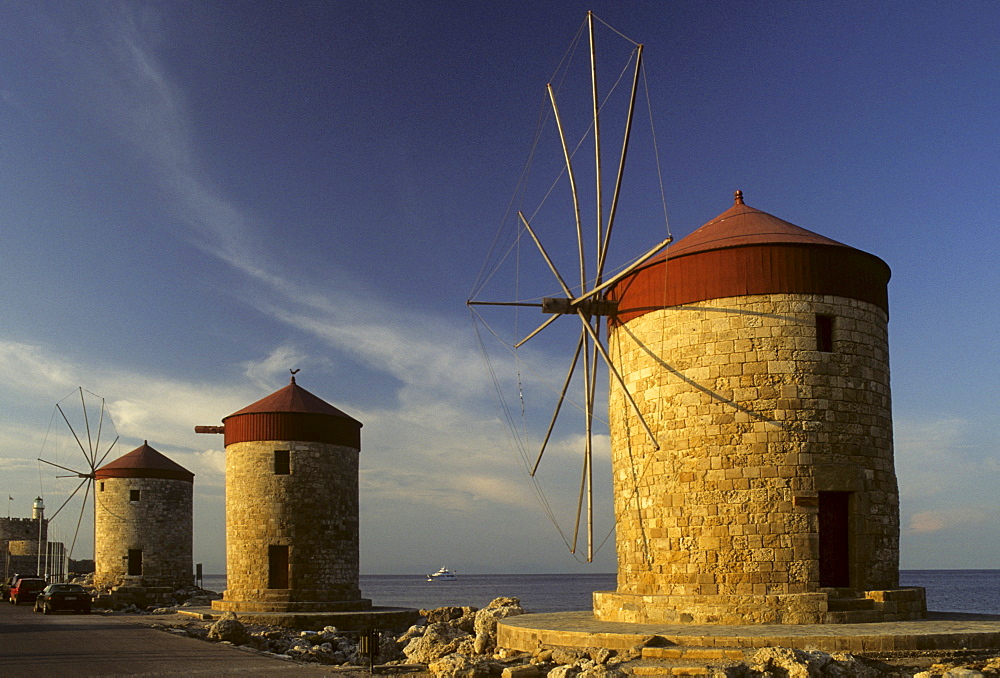 Three windmills on the pier in Mandraki Harbour, Rhodos Island, Dodecanese Islands, Greece