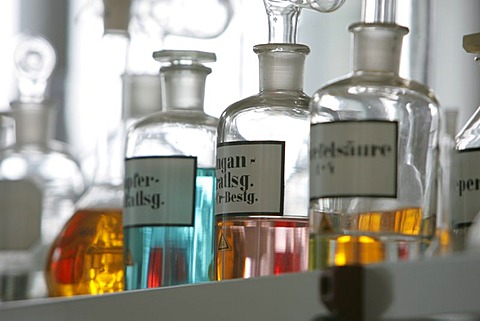 DEU, Germany: Bottles, apparatus, chemical in a chemical laboratory.