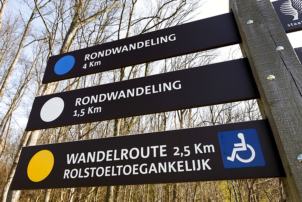 Walking routes signpost in Dutch, some suitable for wheelchairs, Westhove Palace near Domburg, Walcheren, Zeeland, Netherlands, Europe