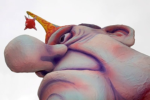 Face of a man with huge nose and mad eyes, caricature made of paper mache, monday before lent parade, Duesseldorf, NRW, Germany