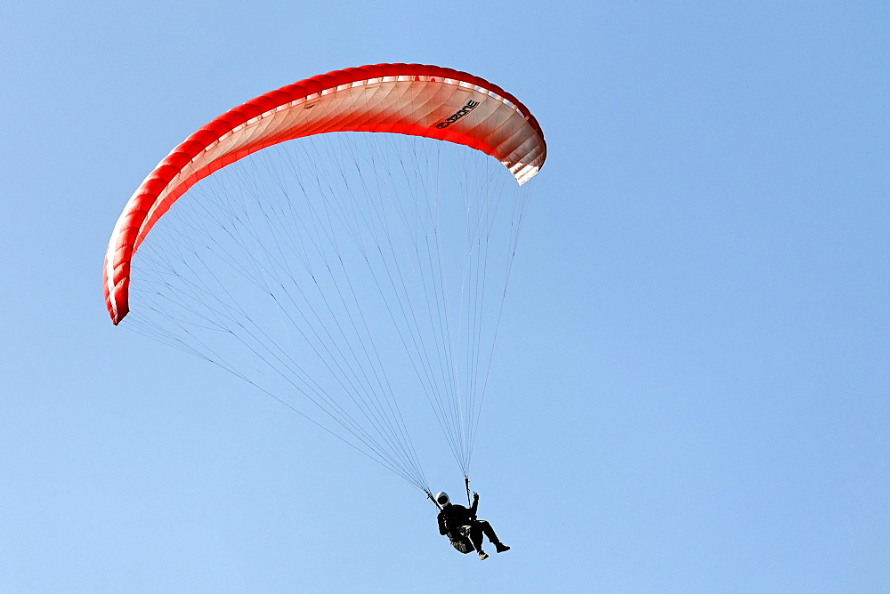 Paraglider banking in the air, Lower Rhine, NRW, Germany