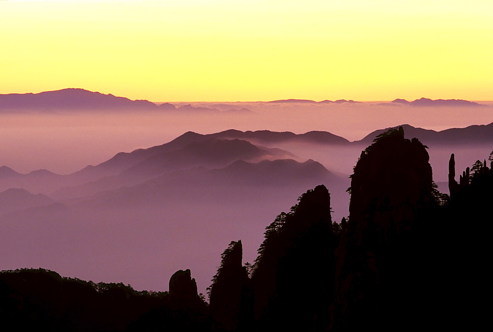 Sunrise at "Eighteen Arhats, " Huangshan, Anhui, China, Asia