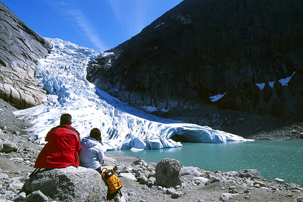 Tourists looking at the tongue of the Jostedalsbreen, Jostedal Glacier, Norway, Scandinavia, Europe