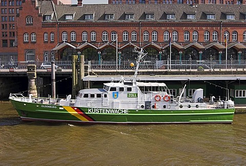 Customs boat Oldenburg in front of the German Customs Museum in the old warehouse district Speicherstadt at Hamburg Harbour, Hamburg, Germany