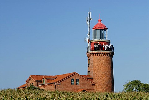 Tourists enjoying the view from the old lighthouse in Bastorf near Kuehlungsborn, Western-Pomerania, Germany