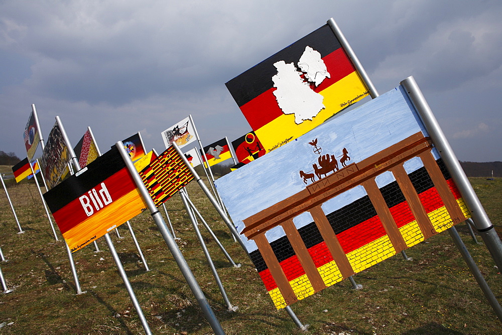 Field of flags, "Sculpture park" national monument to German unity on the Thuringian/Bavarian border near to Henneberg, Rhoen-Grabfeld, Lower Franconia, Bavaria, Germany, Europe