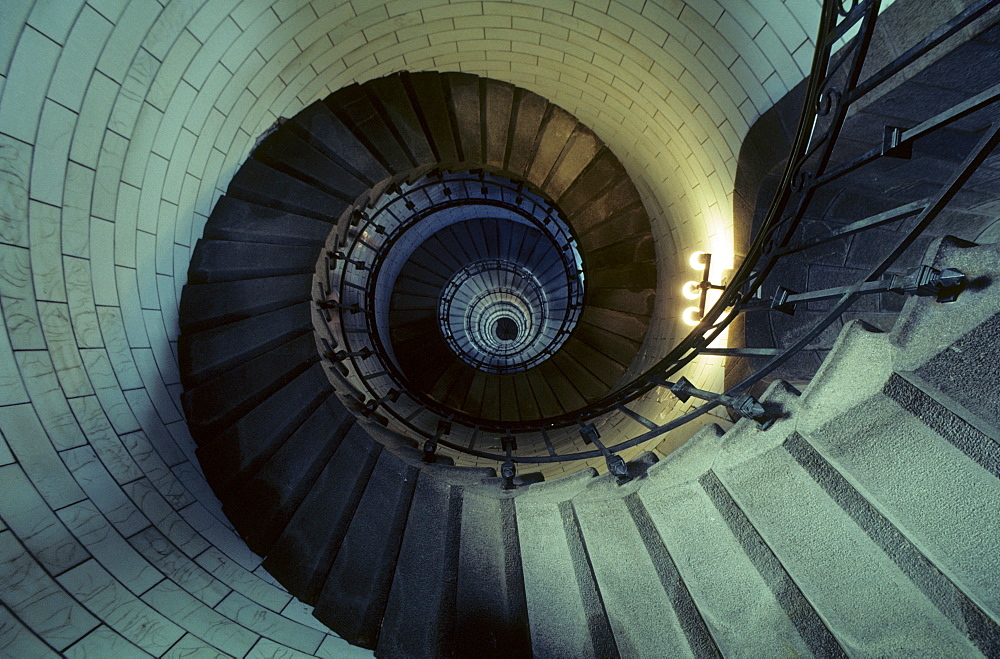 Circular staircase in the lighthouse Phare d'Eckmuehl, Brittany, France