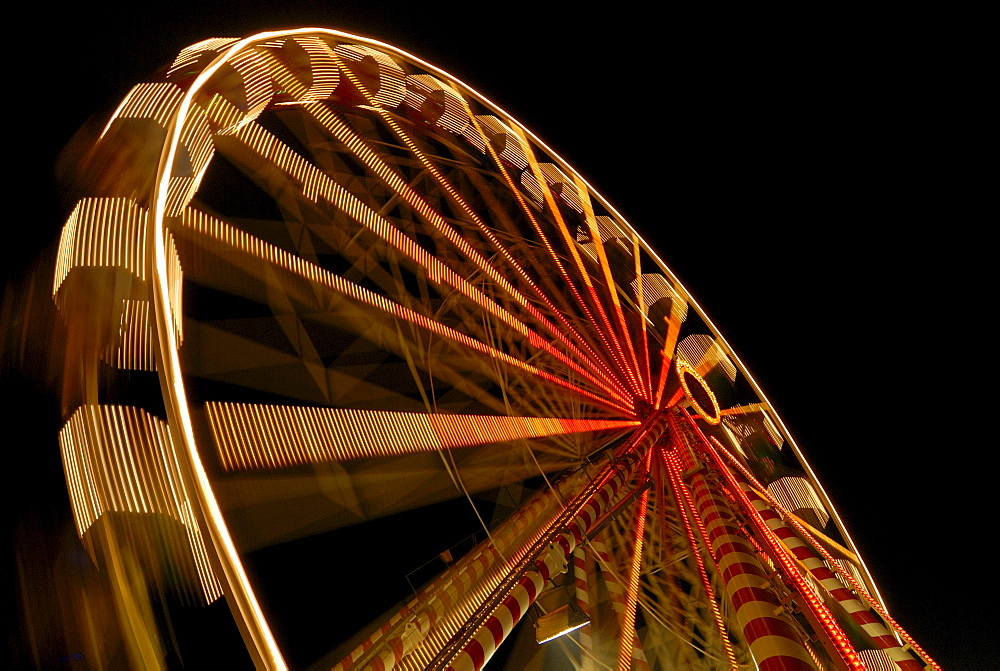 A big wheel on a annual fair - Baden Wuerttemberg Germany Europe.