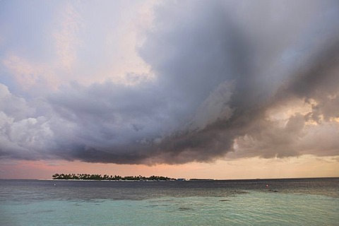 Thunderclouds above an island, Maledives