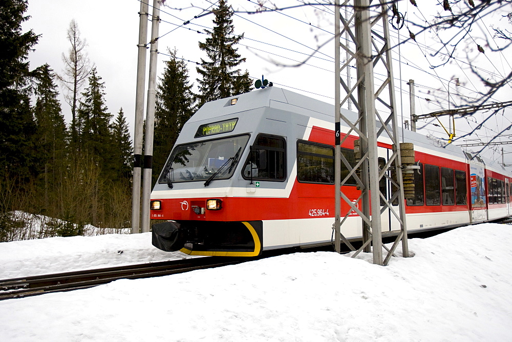 Tatra Electric Railway in the snow, Strbske Pleso, Slovakia, Europe