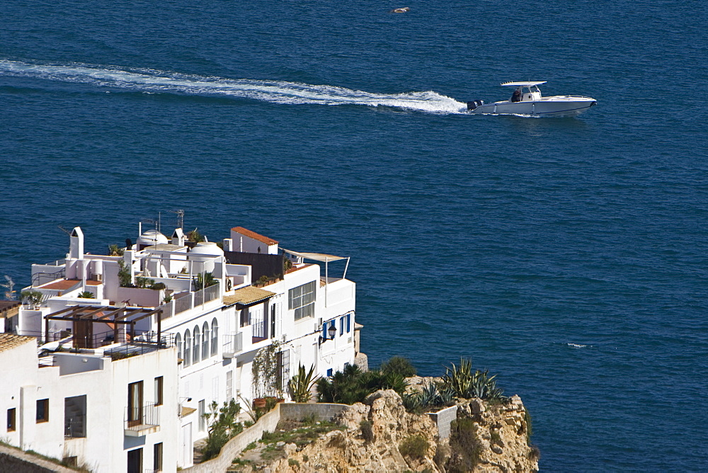 Old building at the coast, motorboat, Eivissa, old part of town, Ibiza, Balearic Islands, Spain