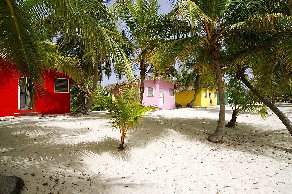 Colourful Caribbean guesthouses on the beach, Catalina Island, Dominican Republic, Caribbean, Americas