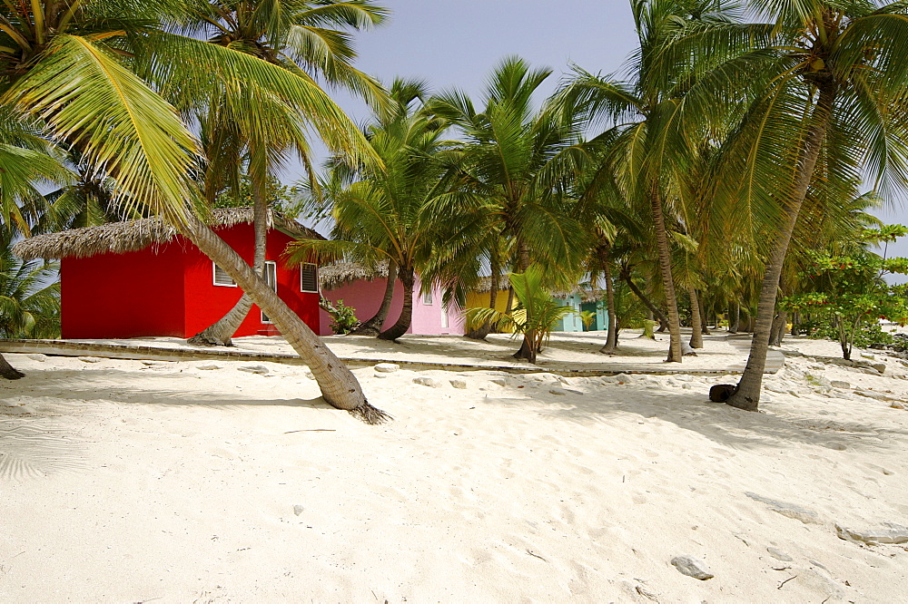 Colourful Caribbean guesthouses on the beach, Catalina Island, Dominican Republic, Caribbean, Americas