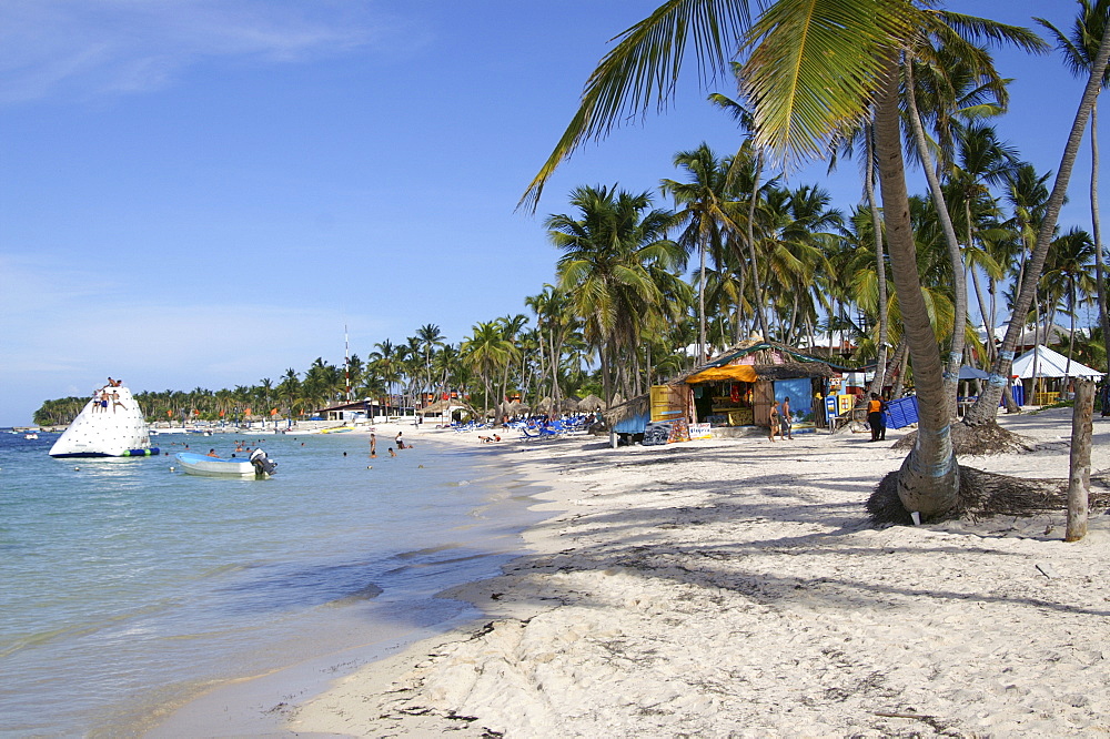 Locals selling souvenirs on the beach in Punta Cana, Dominican Republic, Caribbean, Americas