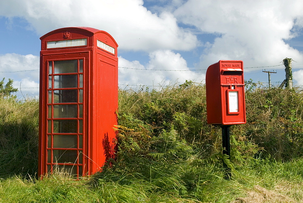 Red phone booth, telephone box and mailbox in Pembrokeshire, Wales, Great Britain, Europe