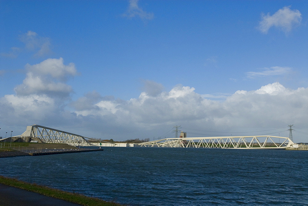 Closed storm surge barrier The Maeslantkering in the Nieuwe Waterweg waterway between Hoek van Holland and Maassluis, part of the Delta Works, Netherlands