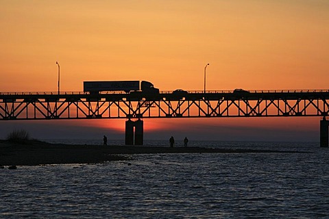 Truck driving across Mackinac Bridge across the Straits of Mackinaw between Mackinac City and St Igance, Michigan, USA