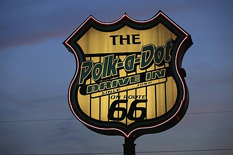 Polk-a-Dot Drive-In Sign and neon illumination at dusk on historic Route 66, Illinois, USA