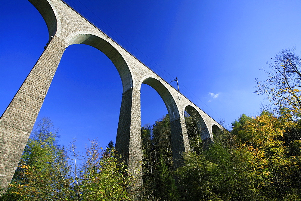 Train viaduct near Luetisburg in autumn colors, St. Gall, Switzerland