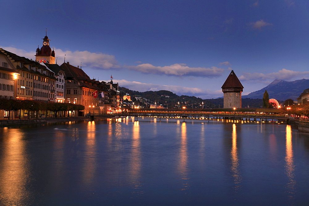 Townhall, Reuss River and historic Kapell Bridge with Watertower, Lucerne, Switzerland