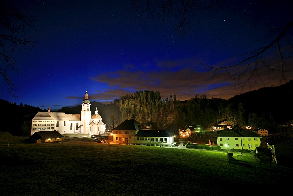 Monastery Fischingen with church at dusk in wintertime, Fischingen, Thurgau, Switzerland