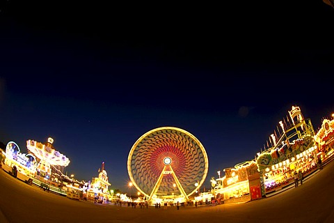 Fun fair with chairoplane and Ferris wheel