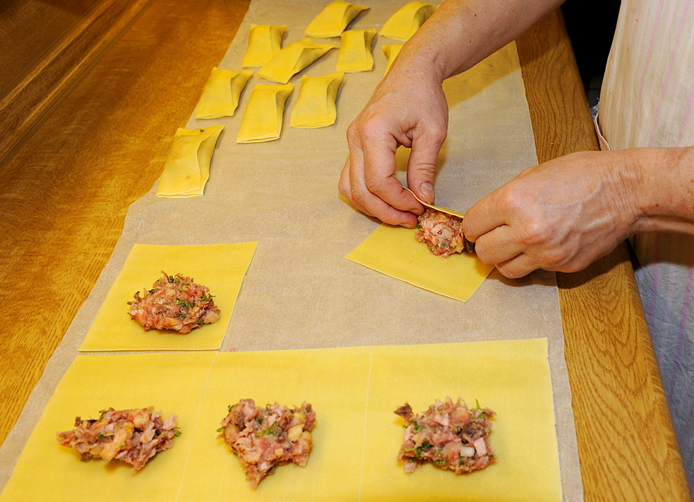 Swabian pockets (cook.) or ravioli (Pasta squares filled with meat and spinach)