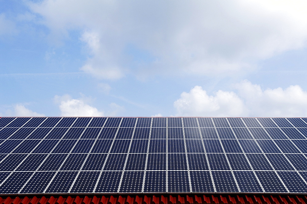 Photovoltaic cells, solar panels installed on a roof, Oberruesselbach, Middle Franconia, Bavaria, Germany, Europe