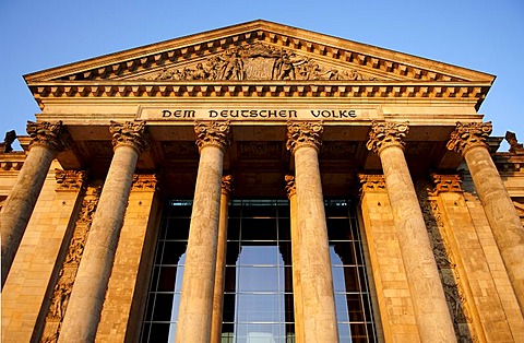 Pillared entrance to the Reichstag or German parliament in evening light, Berlin, Germany, Europe