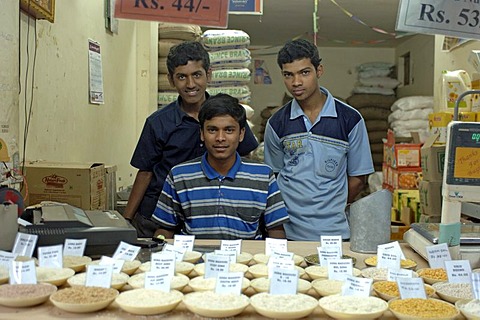 Salesmen in a grocery, Bangalore, India