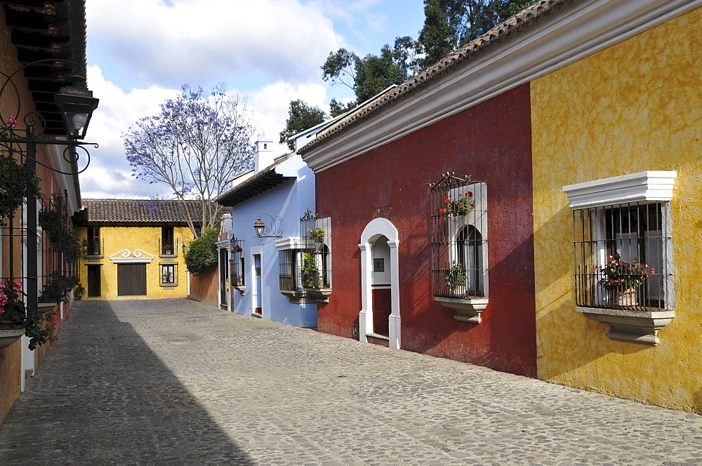 Colourful row of houses, Villa Colonial Hotel, Antigua Guatemala, Guatemala, Central America