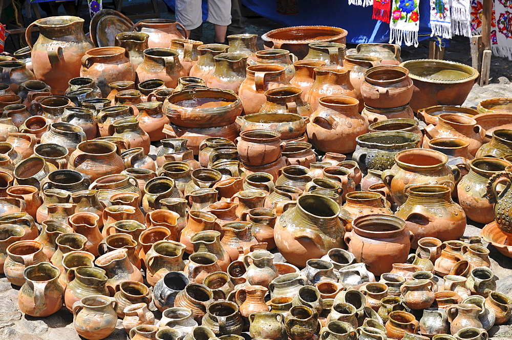 Clay pots sold at a street market in Chichicastenango, Guatemala, Central America