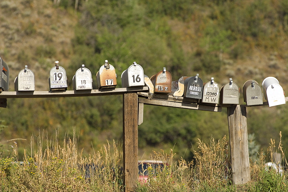 Row of mailboxes on the side of the road in Wyoming, USA