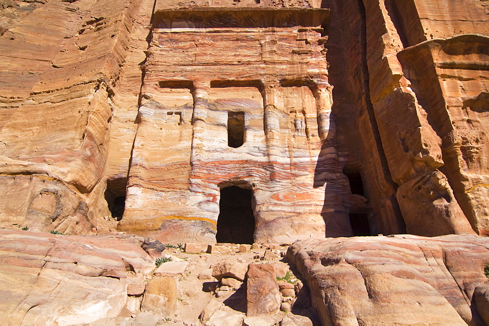 Tombs cut into cliffs, rock face in Petra, Jordan, Middle East